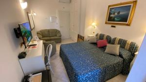 Posezení v ubytování Capri Bougainville Luxury Boutique Hotel