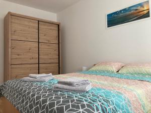 Ліжко або ліжка в номері Apartman N&N