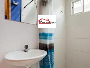 Koupelna v ubytování Hotel Casa Normandia
