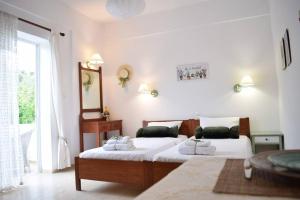 Postel nebo postele na pokoji v ubytování Olive apartment