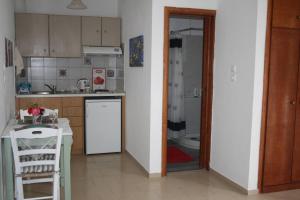 Kuchyň nebo kuchyňský kout v ubytování Olive apartment