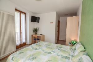 Postel nebo postele na pokoji v ubytování Bed and Breakfast Galet