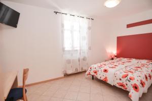 Postel nebo postele na pokoji v ubytování Bed and Breakfast Galet