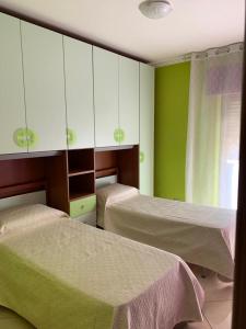 Katil atau katil-katil dalam bilik di Soffio di Sicilia