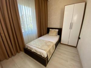 Postel nebo postele na pokoji v ubytování Boutique Sultan Hotel