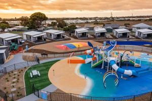 an aerial view of a water park with a water slide at Discovery Parks - Goolwa in Goolwa