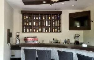 The lounge or bar area at Palo Santo Galápagos Hotel
