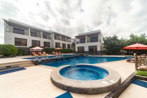 an image of a swimming pool at a resort at Palo Santo Galápagos Hotel in Puerto Ayora