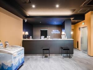Kuchyň nebo kuchyňský kout v ubytování HOTEL LiVEMAX Gifu Ekimae