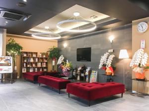TV a/nebo společenská místnost v ubytování HOTEL LiVEMAX Gifu Ekimae