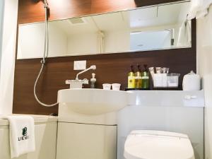 Koupelna v ubytování HOTEL LiVEMAX Gifu Ekimae + 11 fotografií