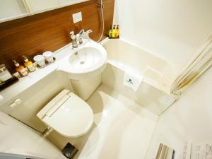Koupelna v ubytování HOTEL LiVEMAX Gifu Hashima Ekimae + 9 fotografií