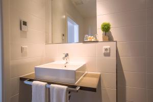 Koupelna v ubytování Aparthotel Altomünster - Garni + 9 fotografií