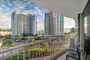 a balcony with a view of tall buildings at The Sebel Twin Towns in Gold Coast