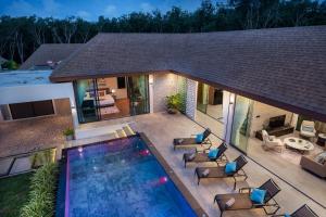 an overhead view of a swimming pool in a house at Inspire Villas Phuket in Rawai Beach