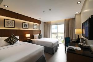 Postel nebo postele na pokoji v ubytování St Mark Hotel + 37 fotografií
