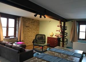 Posezení v ubytování Le Gîte d’Orpha