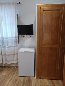 Televizors / izklaižu centrs naktsmītnē B&B Bedda Ista