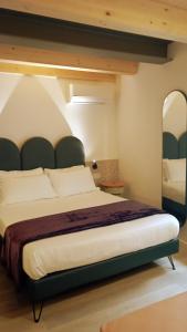 A bed or beds in a room at Relais Sant'Anna