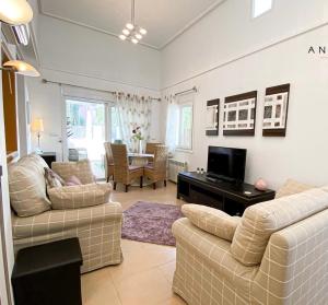 TV a/nebo společenská místnost v ubytování Mar menor golf detached Villa