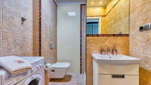 Kúpeľňa v ubytovaní Apartament Maki - 5D Apartamenty