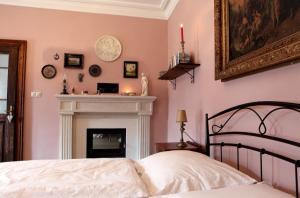 Postel nebo postele na pokoji v ubytování apartmány Antik Pratterov Dom