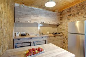 Kuchyňa alebo kuchynka v ubytovaní Terezina wood house