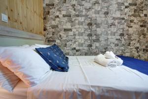 Posteľ alebo postele v izbe v ubytovaní Terezina wood house