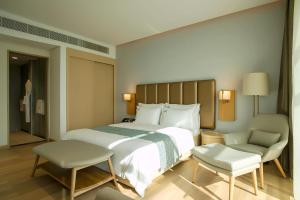 Ένα ή περισσότερα κρεβάτια σε δωμάτιο στο Zoya Health & Wellbeing Resort