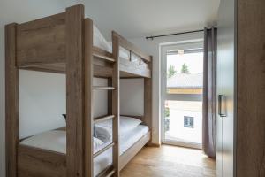 Postel nebo postele na pokoji v ubytování Luxalps- Turrach Alm Chalets Nr 1-4 Grünsee- Sauna- Skifahren- Wandern- Natur