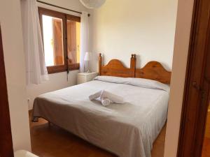 Postel nebo postele na pokoji v ubytování Wonderful Apartment with Outstanding Views - Calella de Palfrugell + 12 fotografií