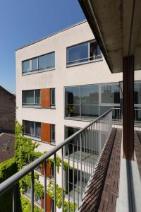 an external view of a building with a balcony at Budapest Holidays Apartments & Spa in Budapest