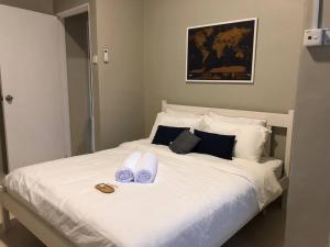Katil atau katil-katil dalam bilik di Lungo Guesthouse
