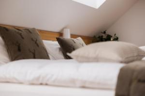 Voodi või voodid majutusasutuse Boutique Skipass Superior Hotel toas