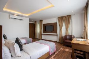TV a/nebo společenská místnost v ubytování Meraki Holistic Wellness Retreat