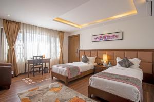 Postel nebo postele na pokoji v ubytování Meraki Holistic Wellness Retreat