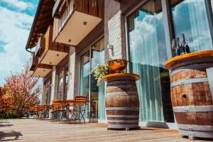Rõdu või terrass majutusasutuses Boutique Skipass Superior Hotel