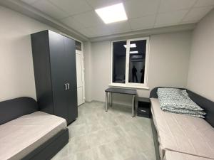 Ein Bett oder Betten in einem Zimmer der Unterkunft AF TRANS Hotel