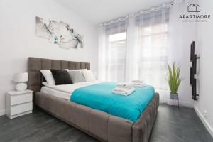 Posteľ alebo postele v izbe v ubytovaní City Center - Torunska 18 by Apartmore