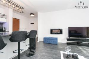 Televízia a/alebo spoločenská miestnosť v ubytovaní City Center - Torunska 18 by Apartmore