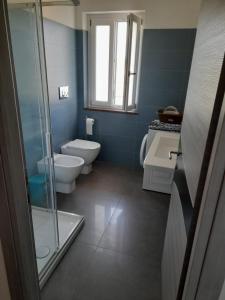 Phòng tắm tại Appartamenti Antico Uliveto