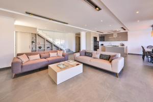 A seating area at Luxury 5 bedroom villa with heated infinity pool & amazing sea views