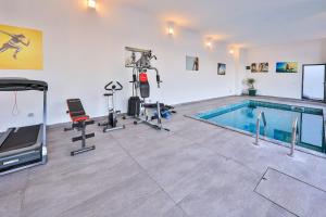 The fitness centre and/or fitness facilities at Luxury 5 bedroom villa with heated infinity pool & amazing sea views
