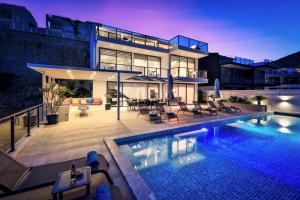 The swimming pool at or close to Luxury 5 bedroom villa with heated infinity pool & amazing sea views