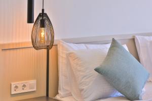 A bed or beds in a room at Luxury 5 bedroom villa with heated infinity pool & amazing sea views