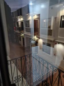 a view of a balcony with a view of a room at Kdc Homes in Puerto Princesa City