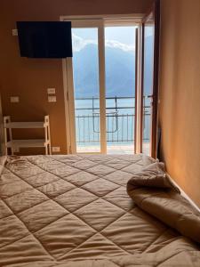 A bed or beds in a room at Villa Castello only room