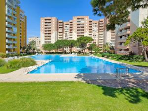 Afbeelding uit fotogalerij van Global Properties, Practico apartamento con piscina en Residencial Brezo Canet in Canet de Berenguer