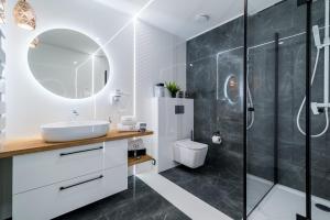 Kúpeľňa v ubytovaní Q18 ApartHotel