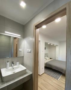 Ett badrum på BIKE & FUN Apartments - Balatonakarattya